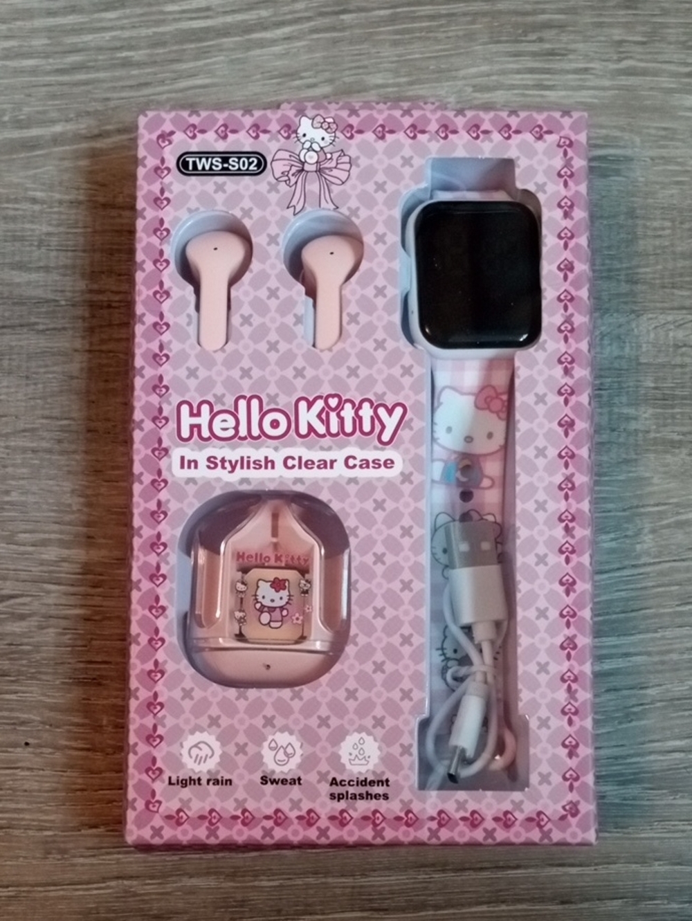 Hello Kitty Pink Earbuds, Charging Case & Matching Smartwatch Strap - Picture 1 of 4
